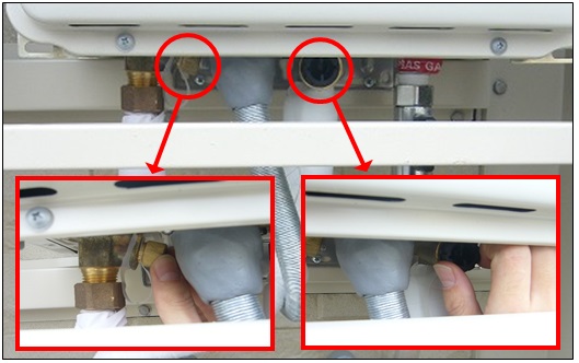 Open two drain taps located under water heater
